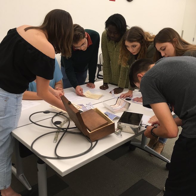 Students working in escape room